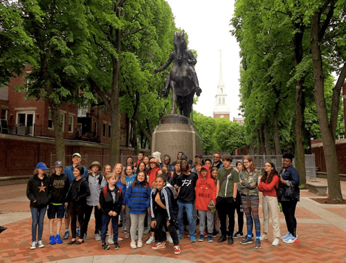 Students in front of the Paul Revere Statue in Boston, Massachusetts.