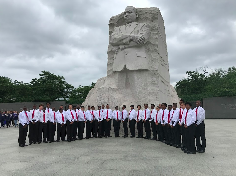 Students posing in front of the MLK Memorial in Washington, D.C.