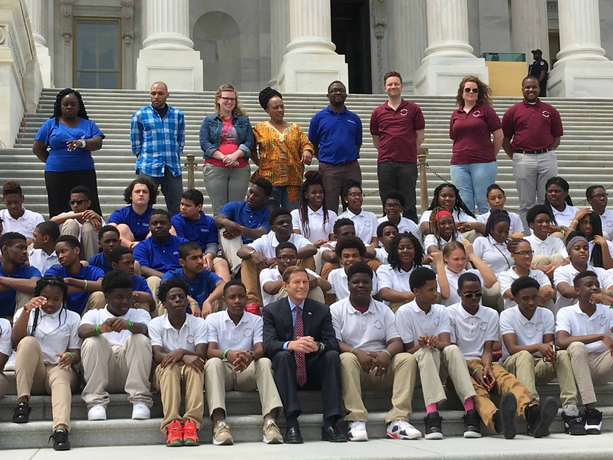 Senator Murphy with a students on a civics class trip to Washington dc at the US Capitol