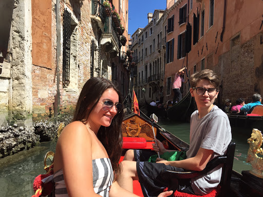 students on a gondola ride in venice