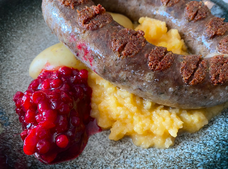Traditional Roros, Norway sausage link with lingonberry sauce  