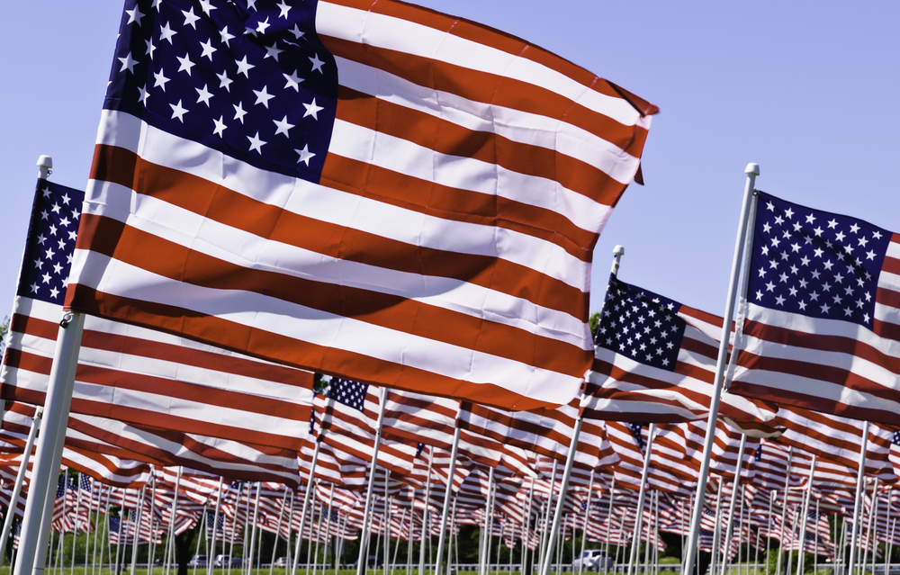 American Flag waving in the wind on a national holiday. 