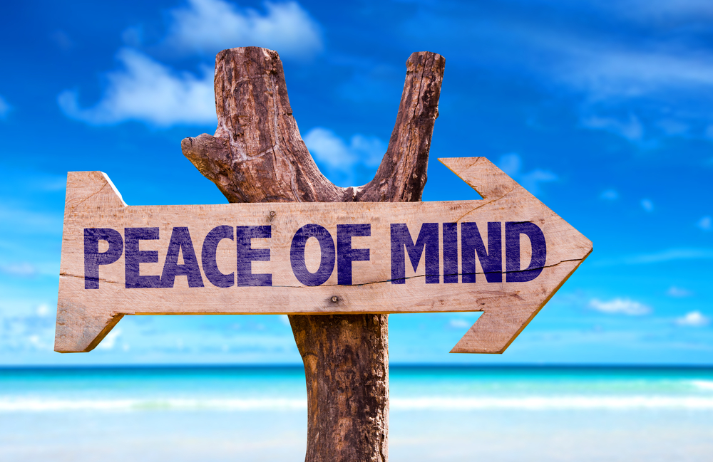 Peace of mind sign on a beach