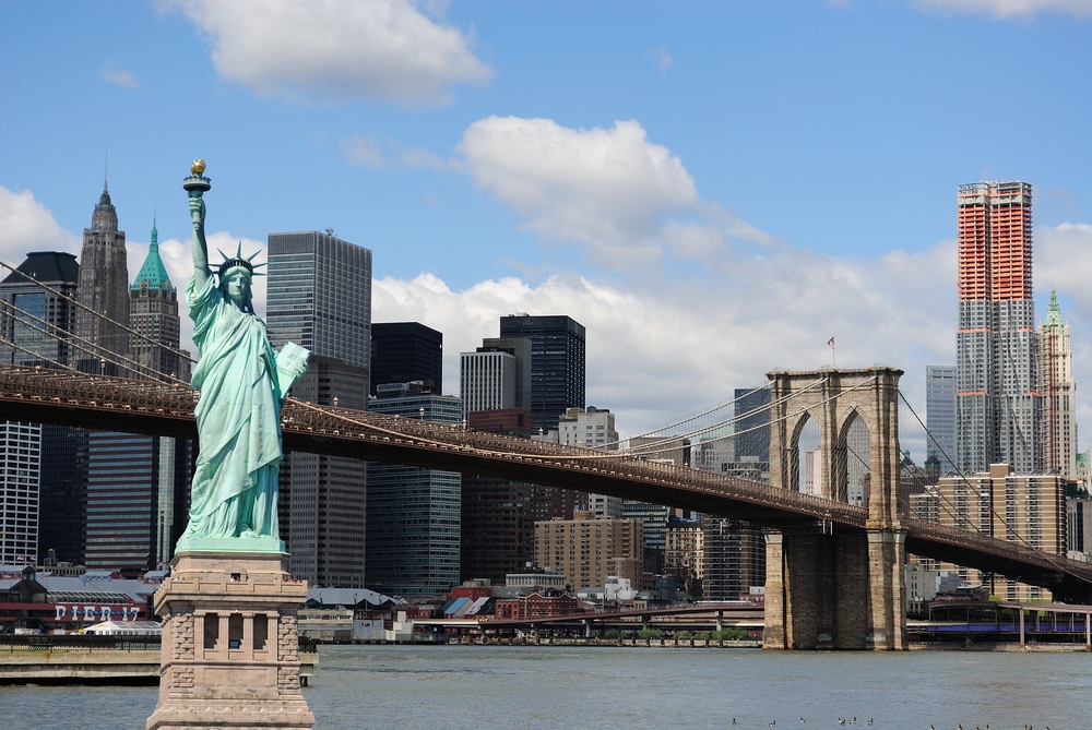 Lady Liberty and the New York skyline. 