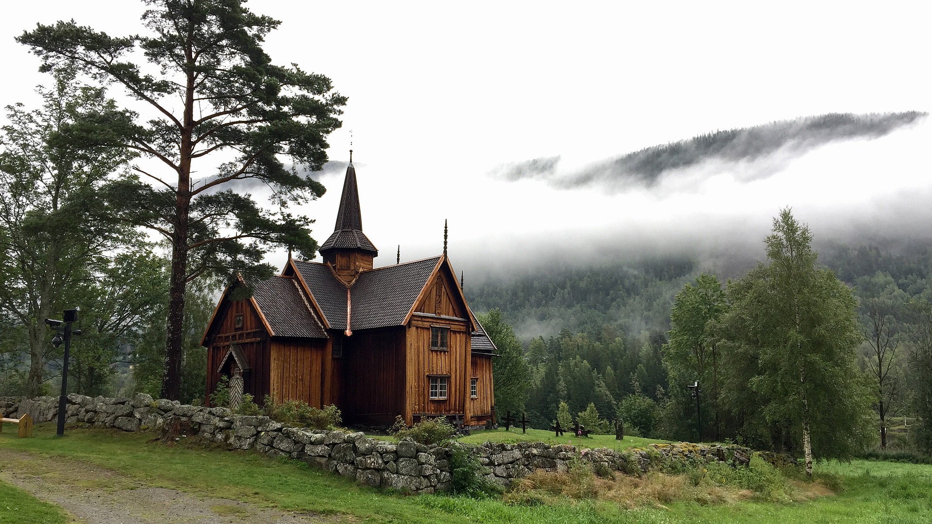 Stave wooden church in forest area of Norway